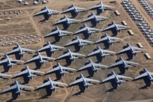 Top-down aerial view of an organized desert boneyard
