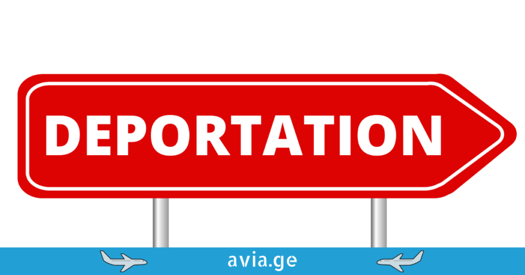 A red directional road sign with the word "DEPORTATION" in white bold letters, featuring the avia.ge logo at the bottom.