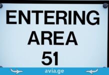 საიდუმლო „Area 51“-ის რეისები: ავიაკომპანია, რომელიც არ არსებობს A restricted warning sign on a chain-link fence that reads "Entering Area 51."