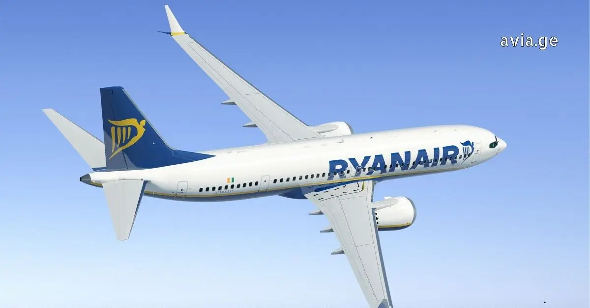 A close-up view of a Ryanair plane in the sky.