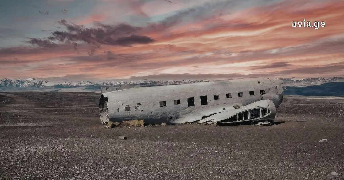Wreckage of a Douglas DC-3 aircraft at the Sólheimasandur plane crash site in Iceland at sunset