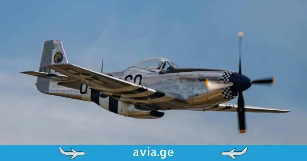 A polished P-51 Mustang in flight.