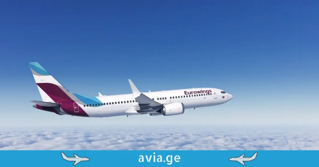 An inflight view of a white and purple Eurowings commercial airplane flying above the clouds.