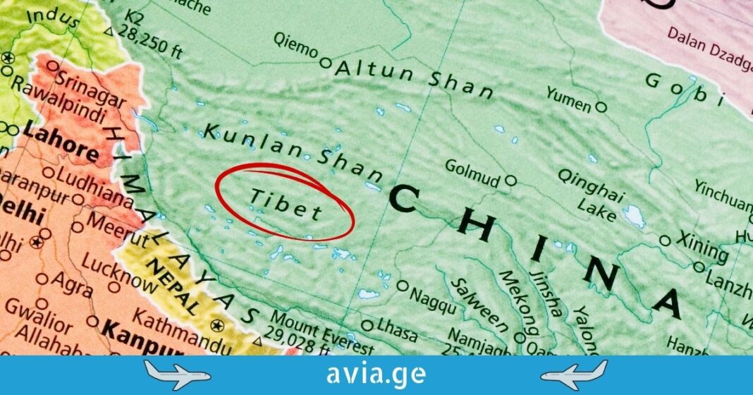 Detailed Map of Tibet Circled in Red A close-up map showing China and Tibet, with "Tibet" circled in red. The avia.ge logo banner is at the bottom with small airplane icons.