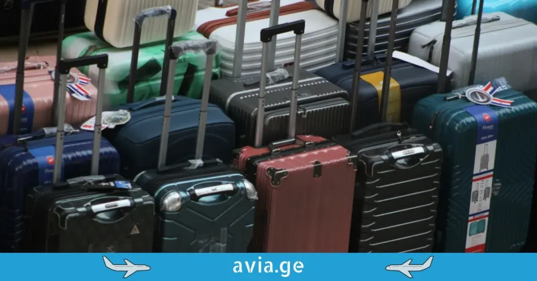 A large group of various colorful suitcases and travel bags stored together, representing lost or unclaimed baggage. Unclaimed luggage at the airport warehouse