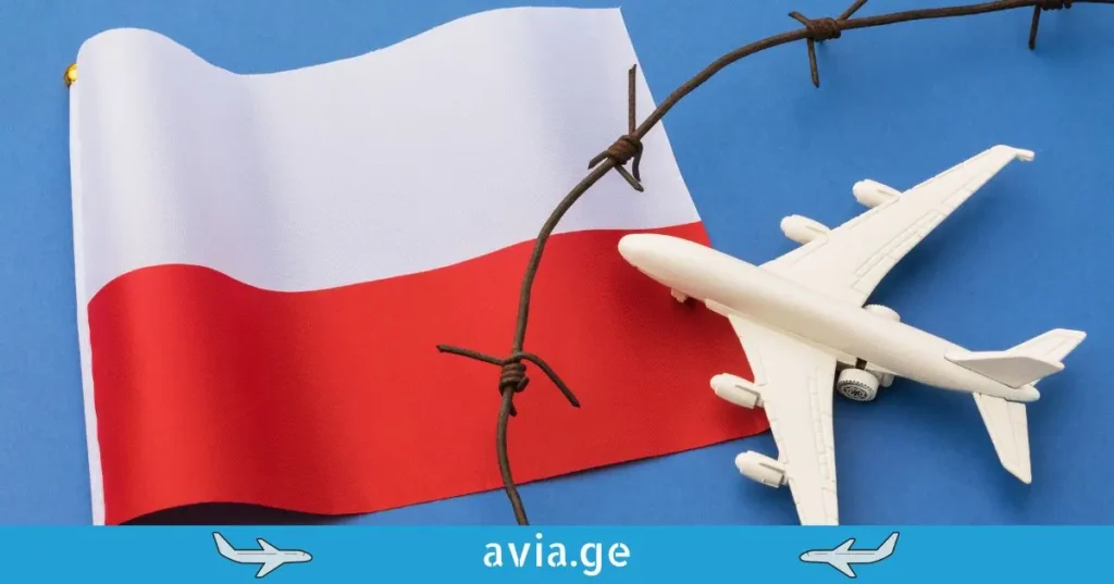 Polish flag behind barbed wire