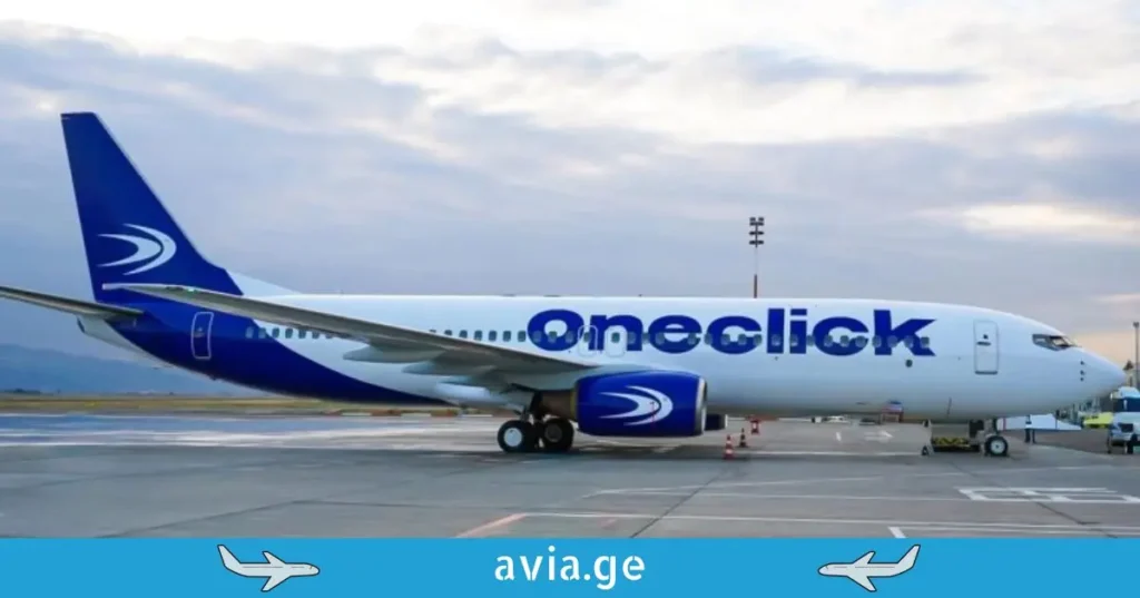 OneClick Airways Boeing 737 on the airport tarmac.