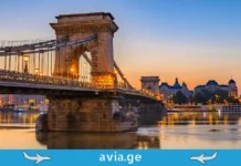 ერთი შეცდომა თვითმფრინავში, რომელიც სმენის დაკარგვად დაგიჯდებათ – გაფრთხილება მოგზაურებს ბუდაპეშტის ჯაჭვის ხიდი და დუნაი მზის ჩასვლისას, Avia.ge-ს ლოგოთი.